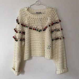 Cute knit sweater with fringe